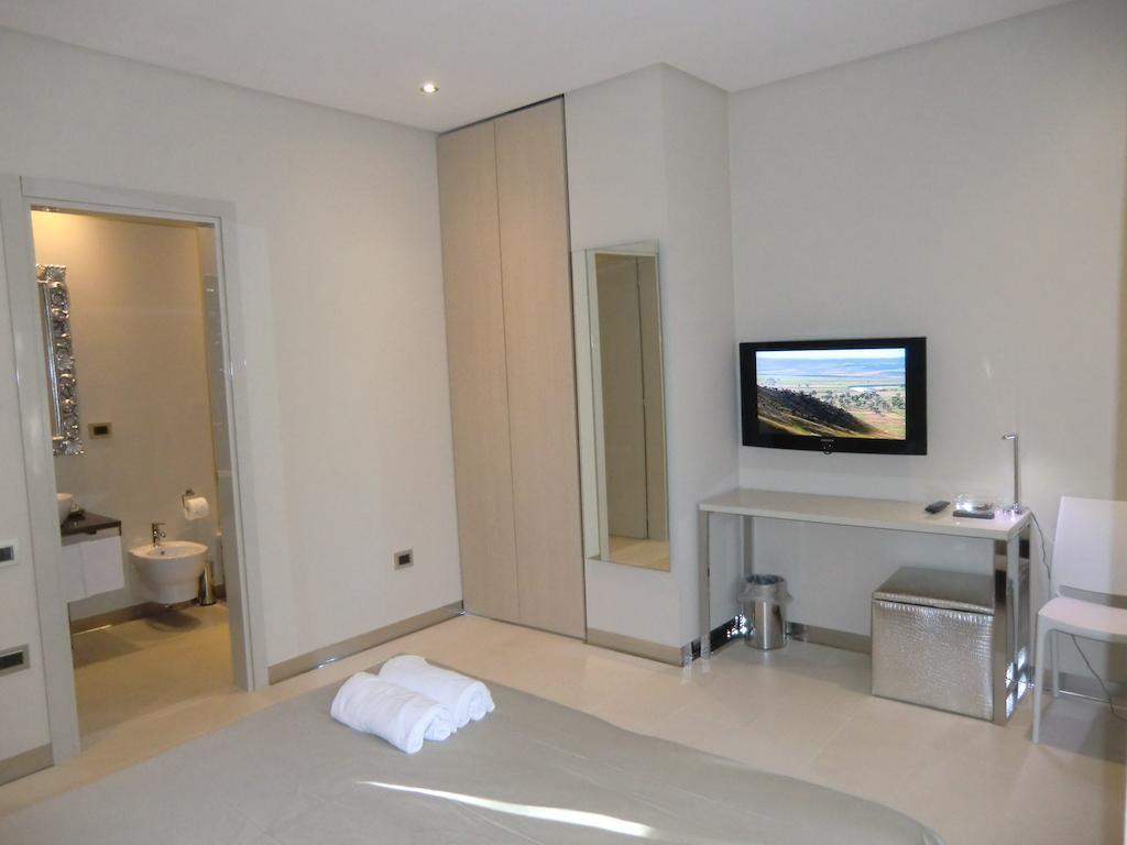 B&Beach Cagliari Guest House Habitación foto
