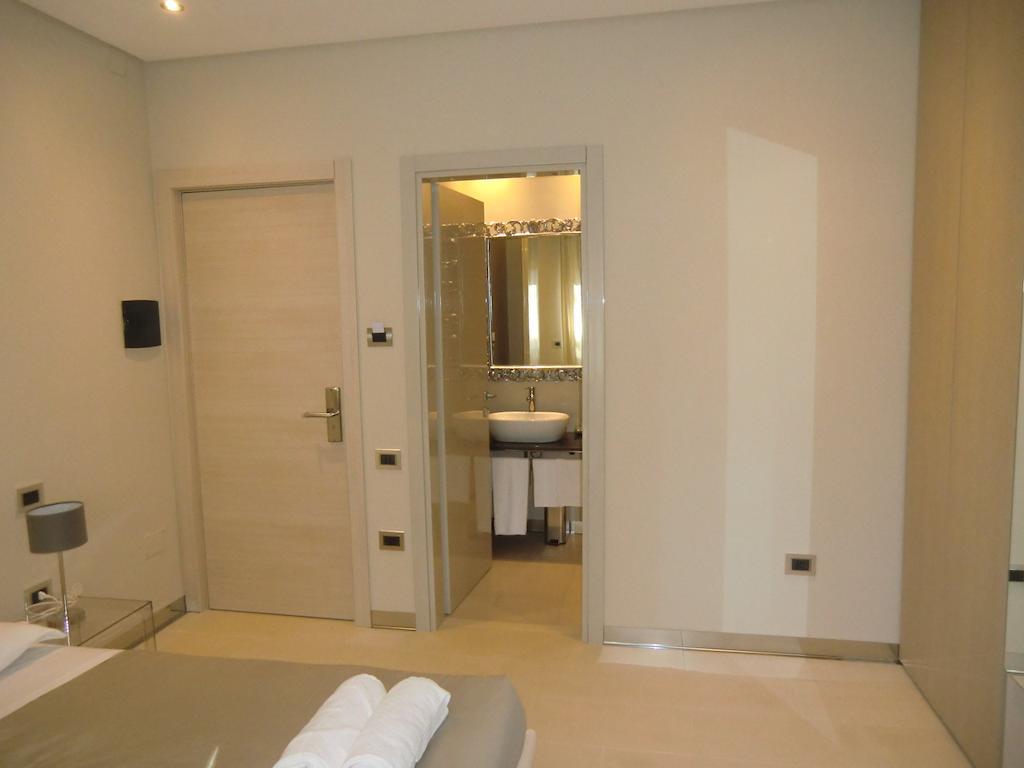 B&Beach Cagliari Guest House Habitación foto
