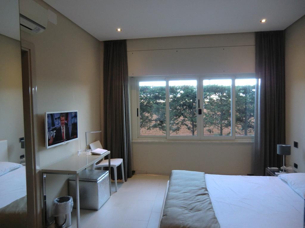 B&Beach Cagliari Guest House Habitación foto