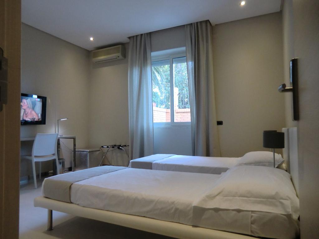 B&Beach Cagliari Guest House Habitación foto